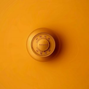 Thermostat with orange background